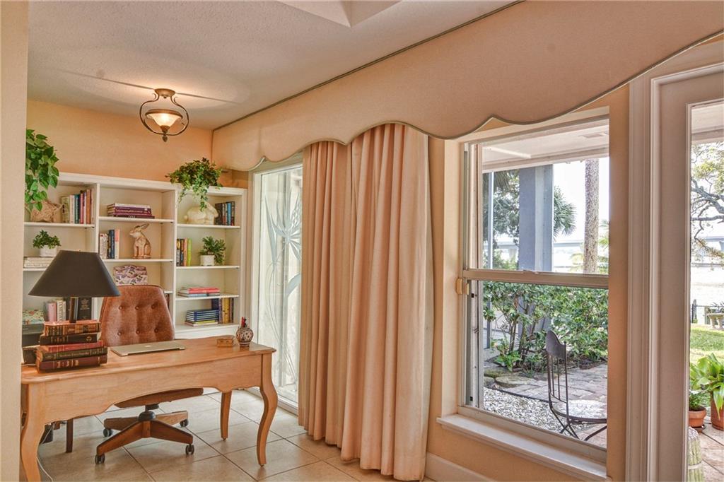 11 North River Road Stuart, FL 34996 - Photo 12 of 31 a room with furniture and a window