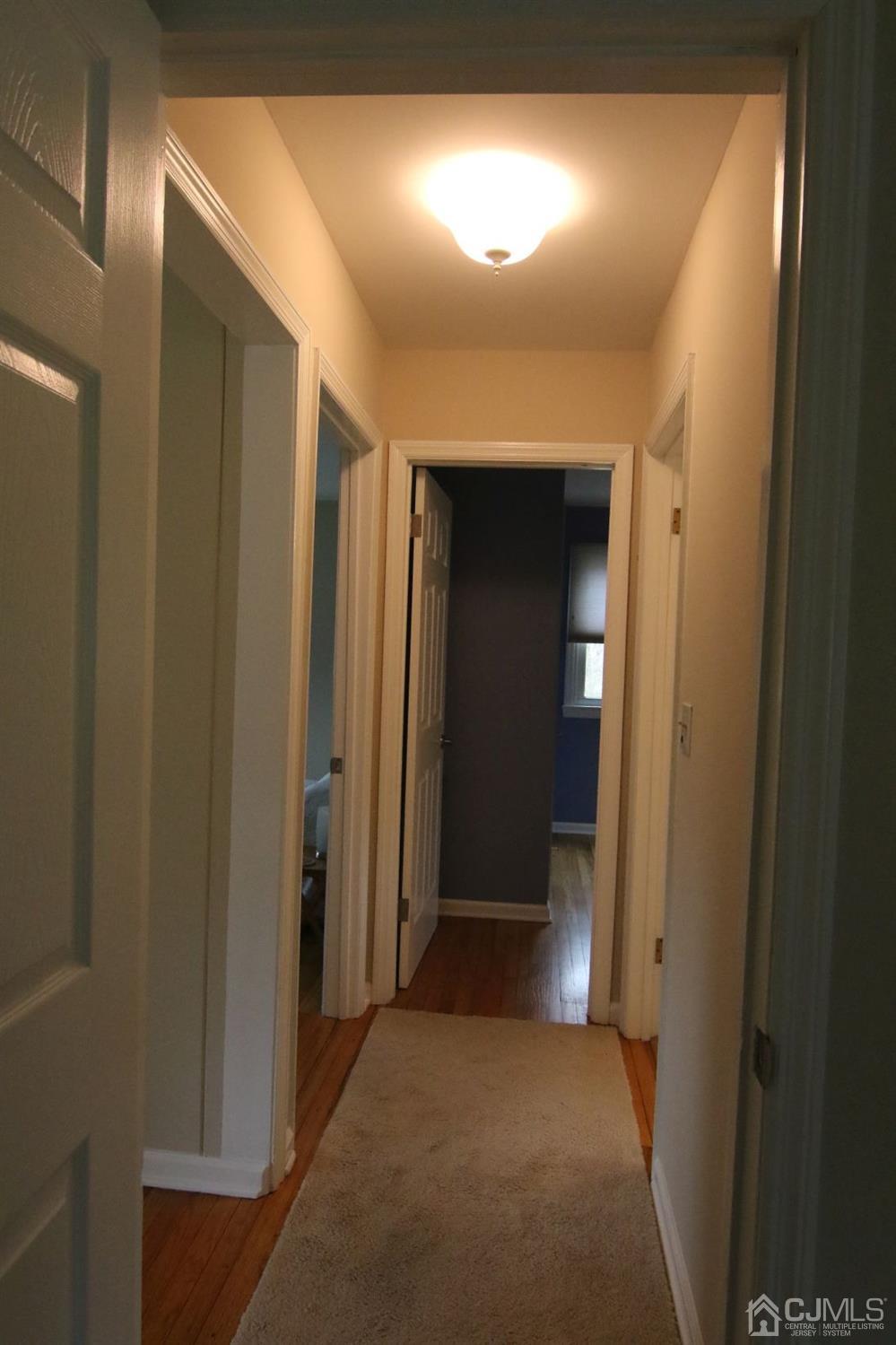 Andersen Andersen Road Bloomsbury, NJ 08804 - Photo 13 of 21 a view of a hallway with wooden shelves