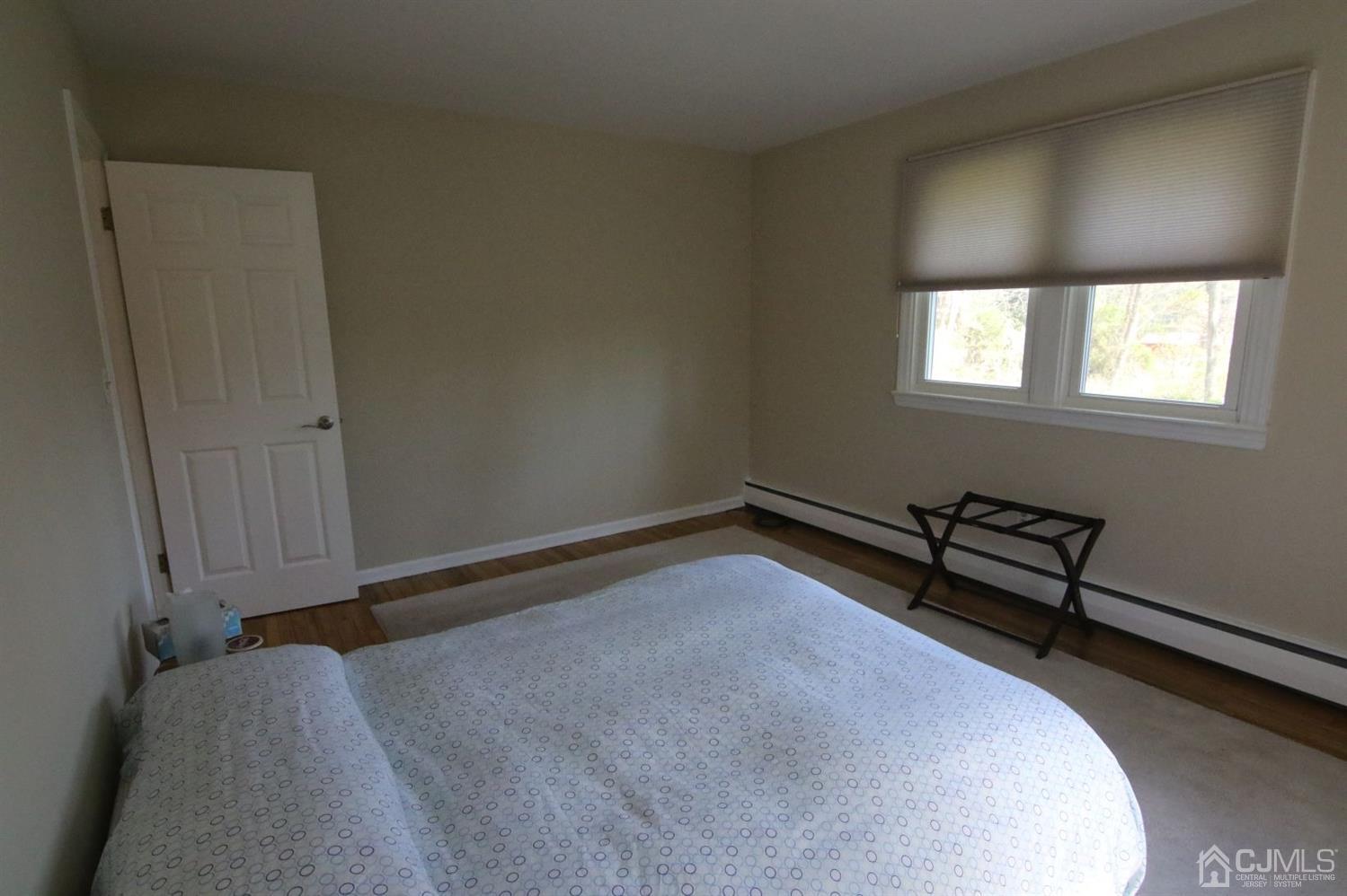 Andersen Andersen Road Bloomsbury, NJ 08804 - Photo 16 of 21 a room with a bed and a window