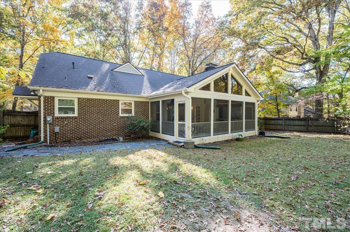 104 Dabney Road Cary, NC 27511 - Photo 34 of 35 a view of a house with a yard