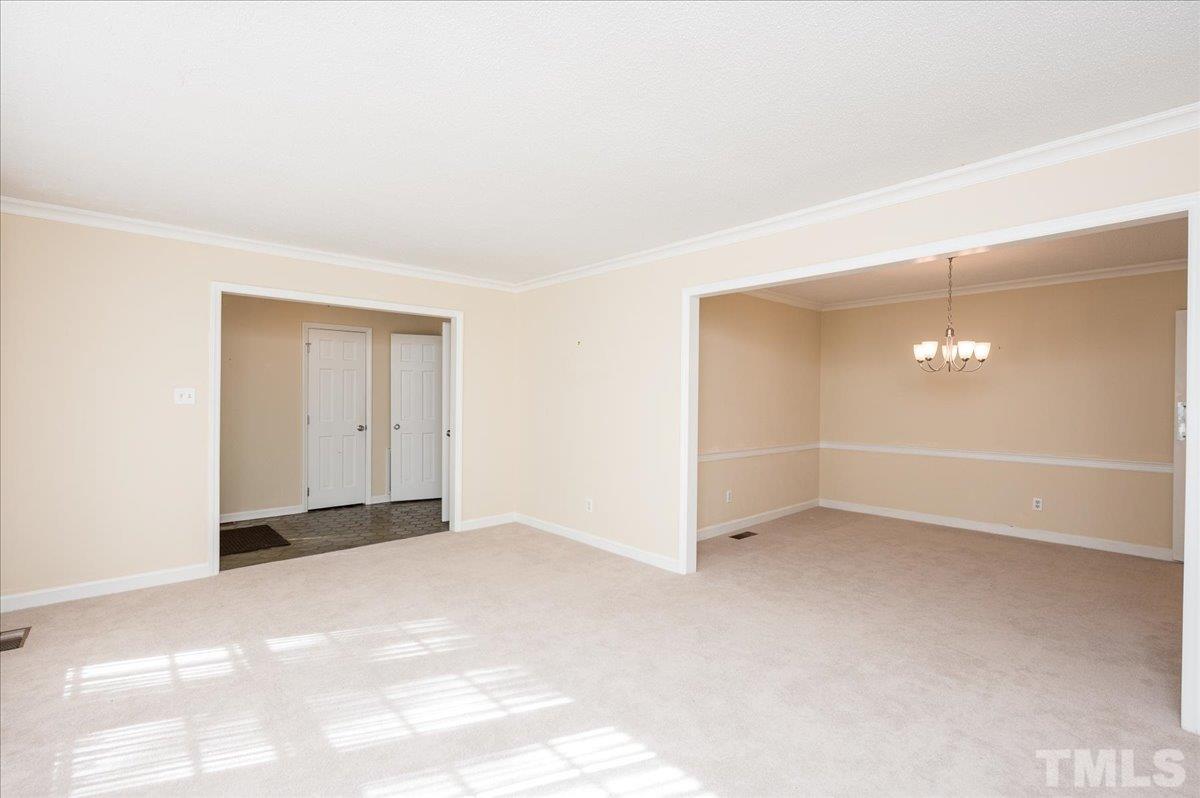 104 Dabney Road Cary, NC 27511 - Photo 7 of 35 a view of an empty room