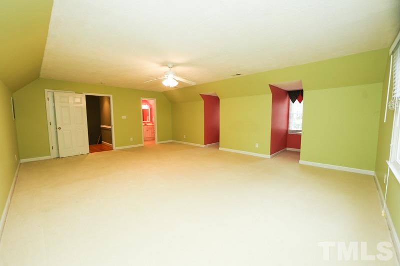 1204 Cliffside Circle Raleigh, NC 27615 - Photo 19 of 22 Spacious bonus room on second floor with walk in closet and full bath.