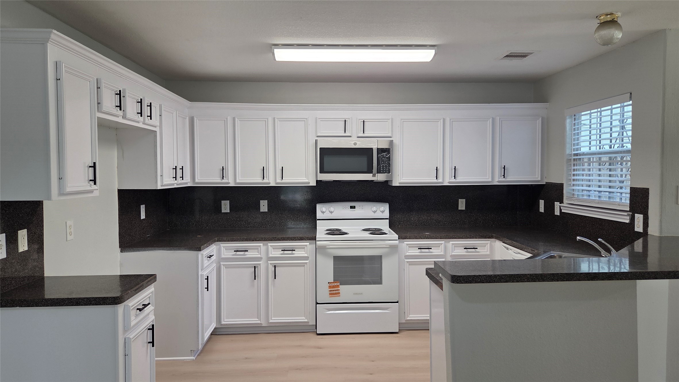 4121 Mallow Street, Unit A/B Houston, TX 77051 - Photo 34 of 50 Unit B - Kitchen with New Stainless Steall Microwave