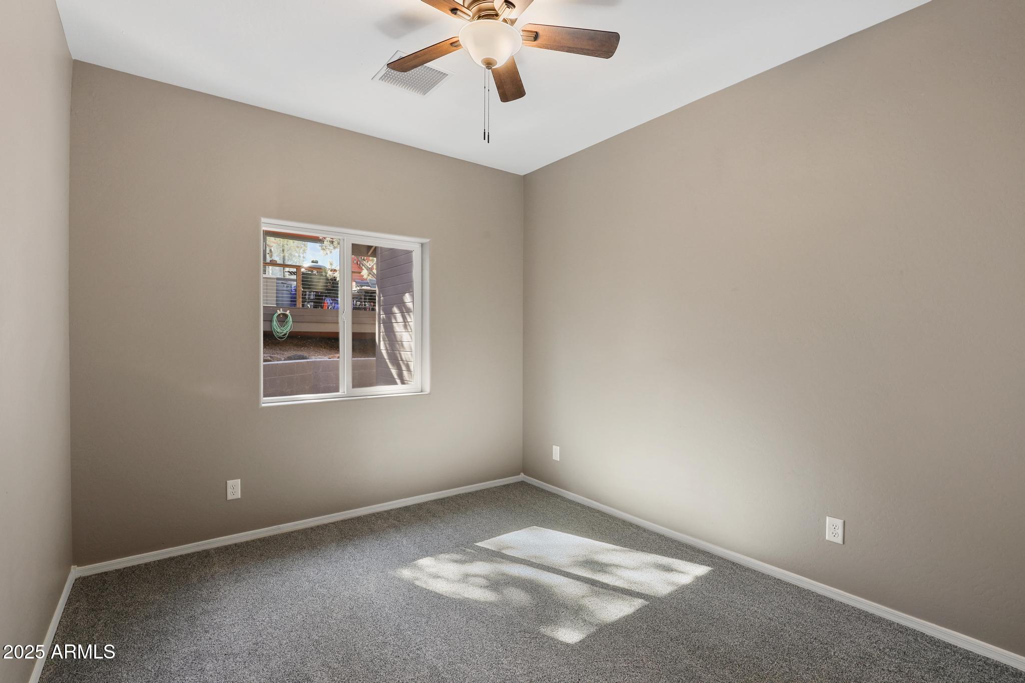1019 South Ponderosa Street Payson, AZ 85541 - Photo 20 of 34 an empty room with a window
