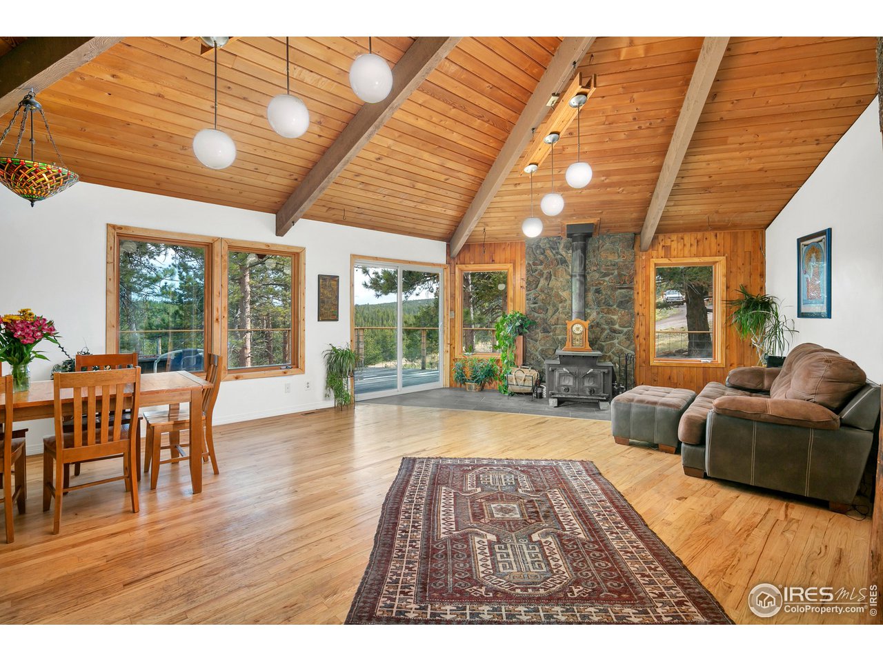 120 Bramer Road Ward, CO 80481 - Photo 39 of 39 Open floor plan with wood stove that keeps the main level warm & cozy