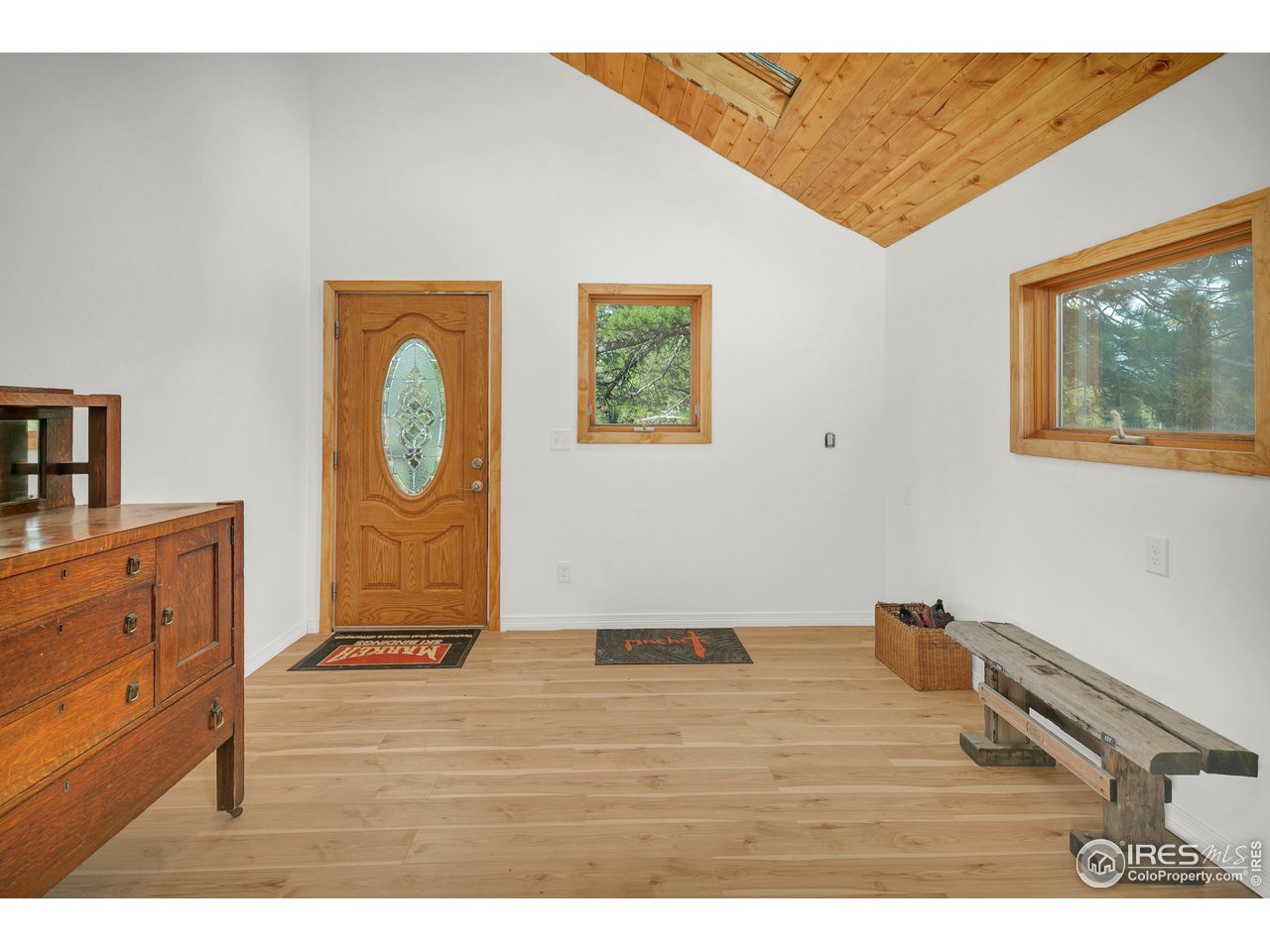 120 Bramer Road Ward, CO 80481 - Photo 7 of 39 Spacious mudroom entry with T/G wood ceilings & skylight
