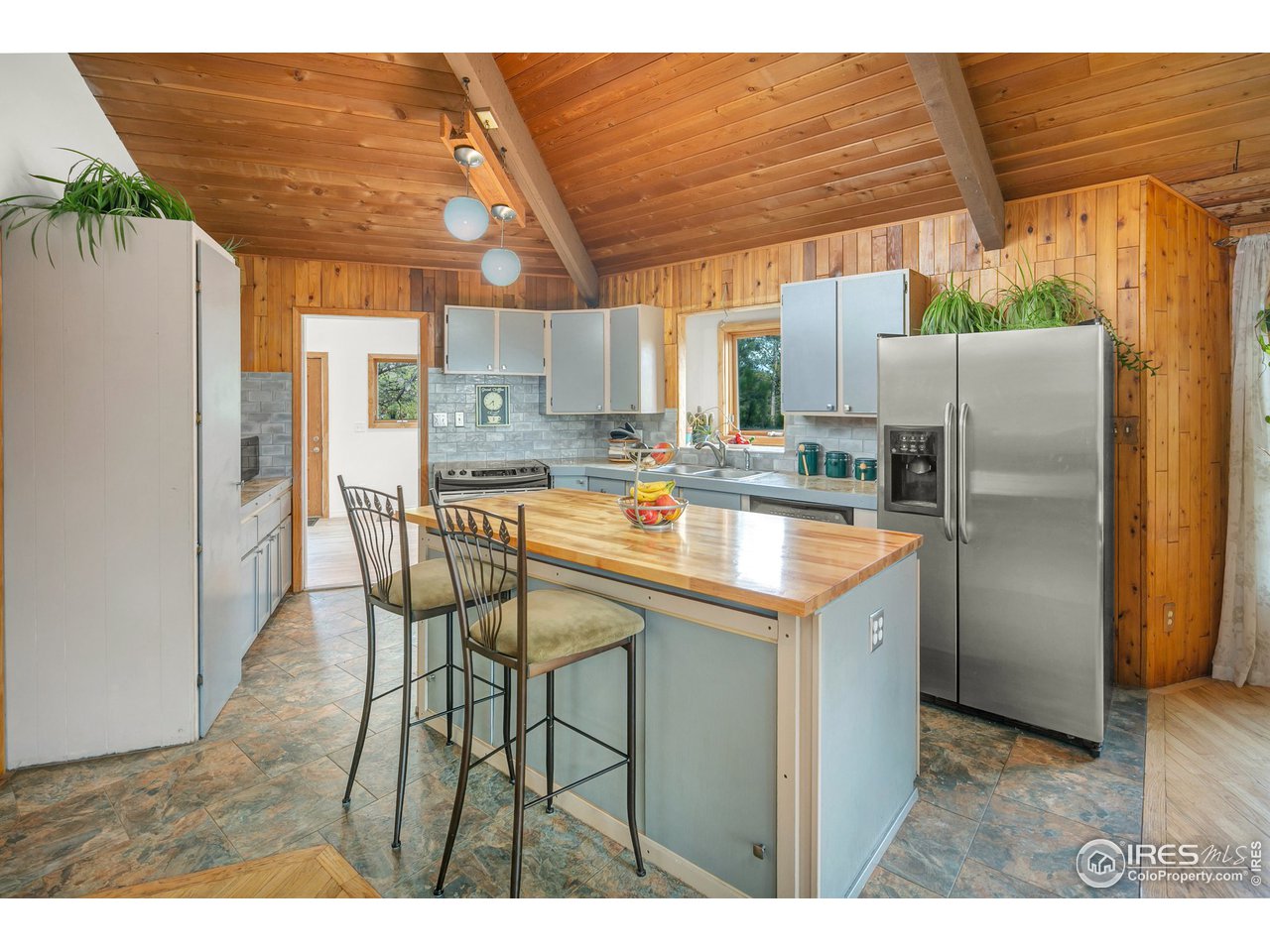 120 Bramer Road Ward, CO 80481 - Photo 8 of 39 Kitchen with butcher block island & updated appliances