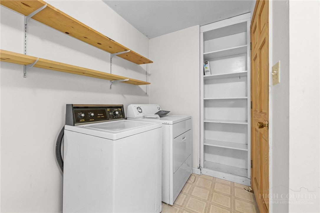 233 Alpine Acres Road Vilas, NC 28692 - Photo 24 of 32 a utility room with dryer and washer