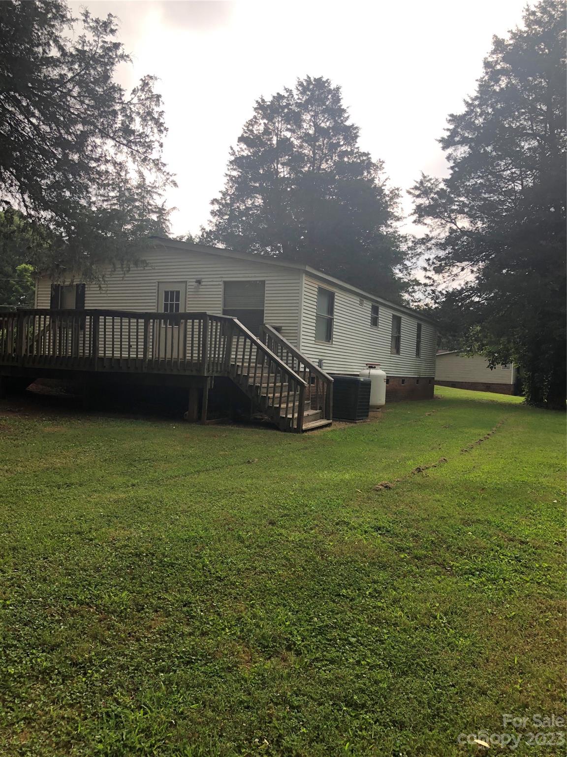 1417 Woodridge Road, Unit 31 Clover, SC 29710 - Photo 3 of 22 a view of a house with a yard