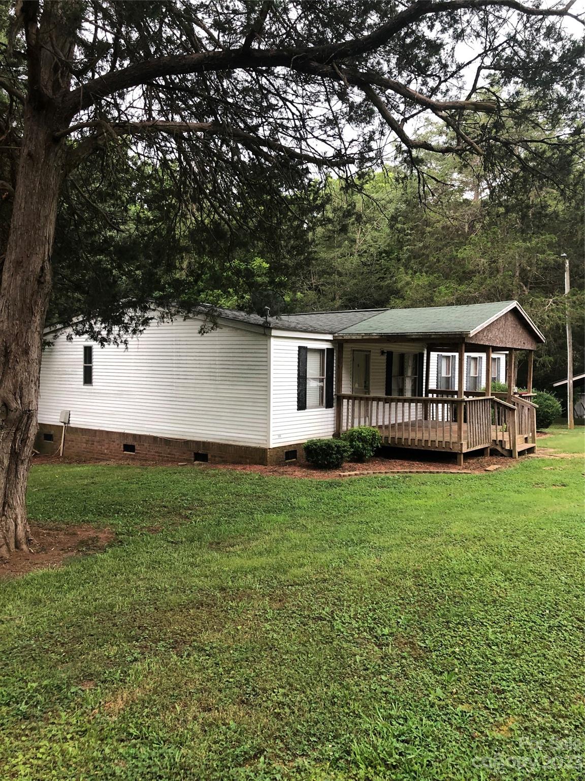 1417 Woodridge Road, Unit 31 Clover, SC 29710 - Photo 5 of 22 a house view with a garden space