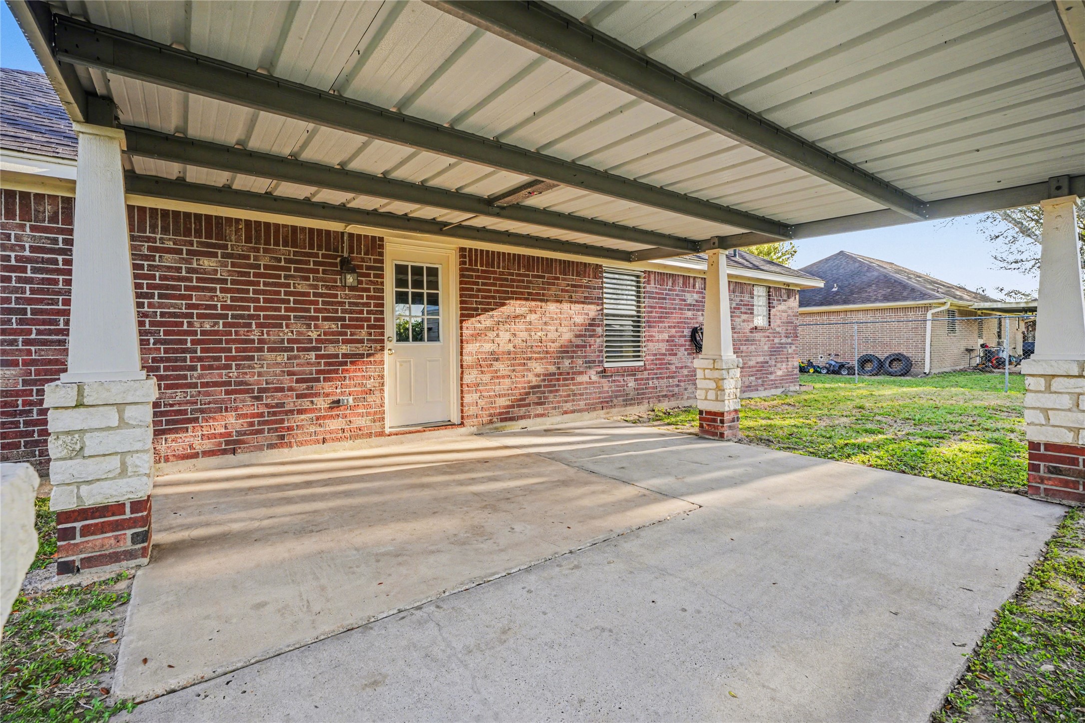 12431 9th Street Santa Fe, TX 77510 - Photo 15 of 18 a front view of a house with a garden and garage