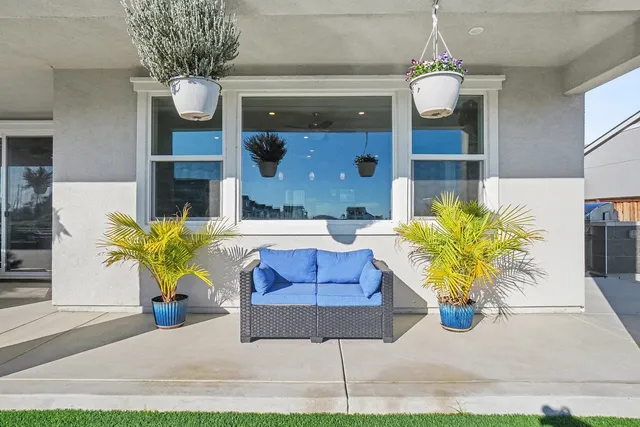a living room with furniture and a window