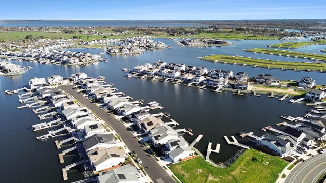 a aerial view of a house with a yard