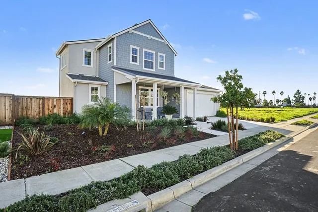 a aerial view of a house with a lake view