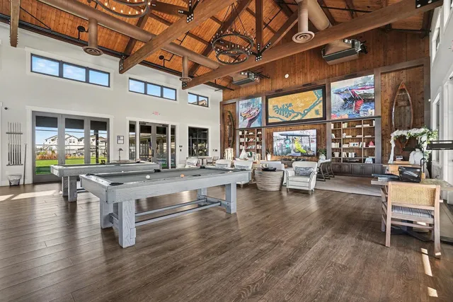 a view of a patio with a table and chairs