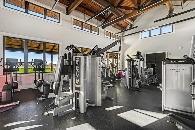 an aerial view of a house with a swimming pool