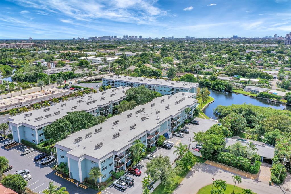 3000 Northeast 5th Terrace, Unit 109A Wilton Manors, FL 33334 - Photo 16 of 36 an aerial view of a city with lots of residential buildings