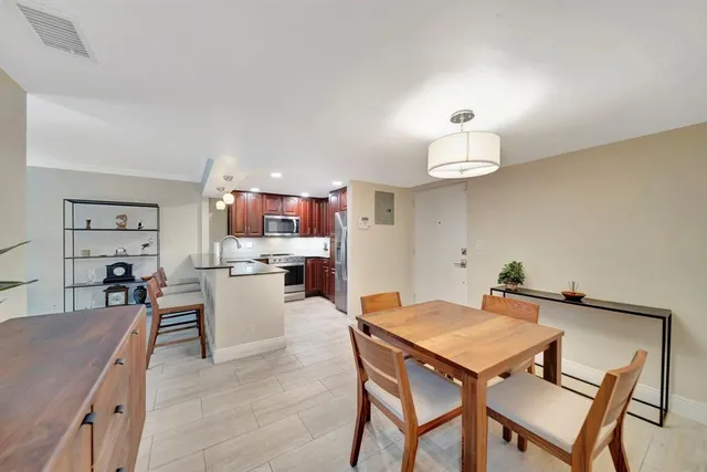 a living room with furniture and a table