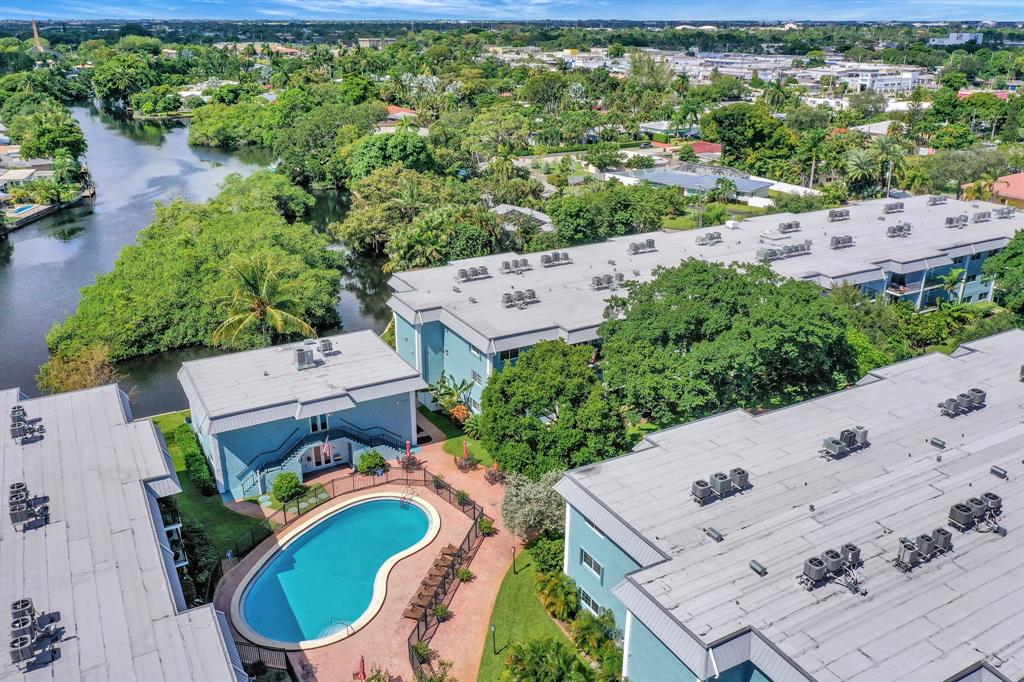 3000 Northeast 5th Terrace, Unit 109A Wilton Manors, FL 33334 - Photo 33 of 36 an aerial view of a house with a yard
