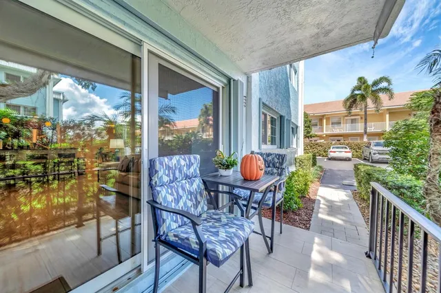 a outdoor view with a sitting space and furniture