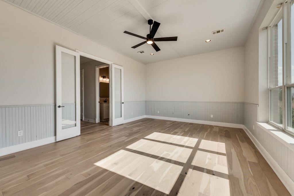 3330 Greathouse Road Waxahachie, TX 75167 - Photo 22 of 40 wooden floor in an empty room with a window