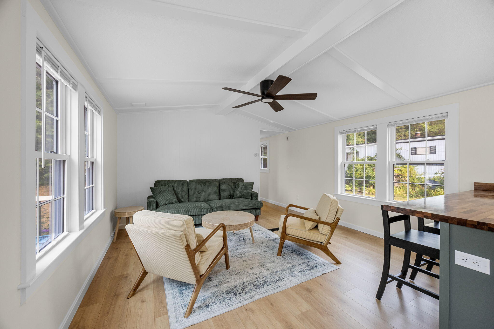 15 1st Street Bourne, MA 02559 - Photo 9 of 30 a living room with furniture and a window