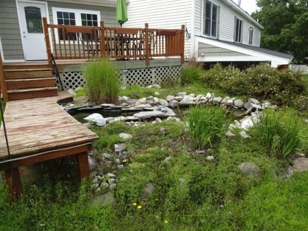 694 North Stiles Road Ludington, MI 49431 - Photo 42 of 50 Deck and pond