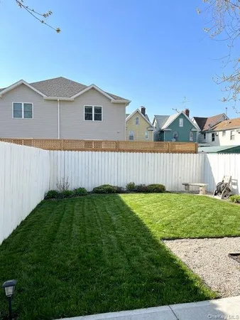 a view of a backyard with a garden