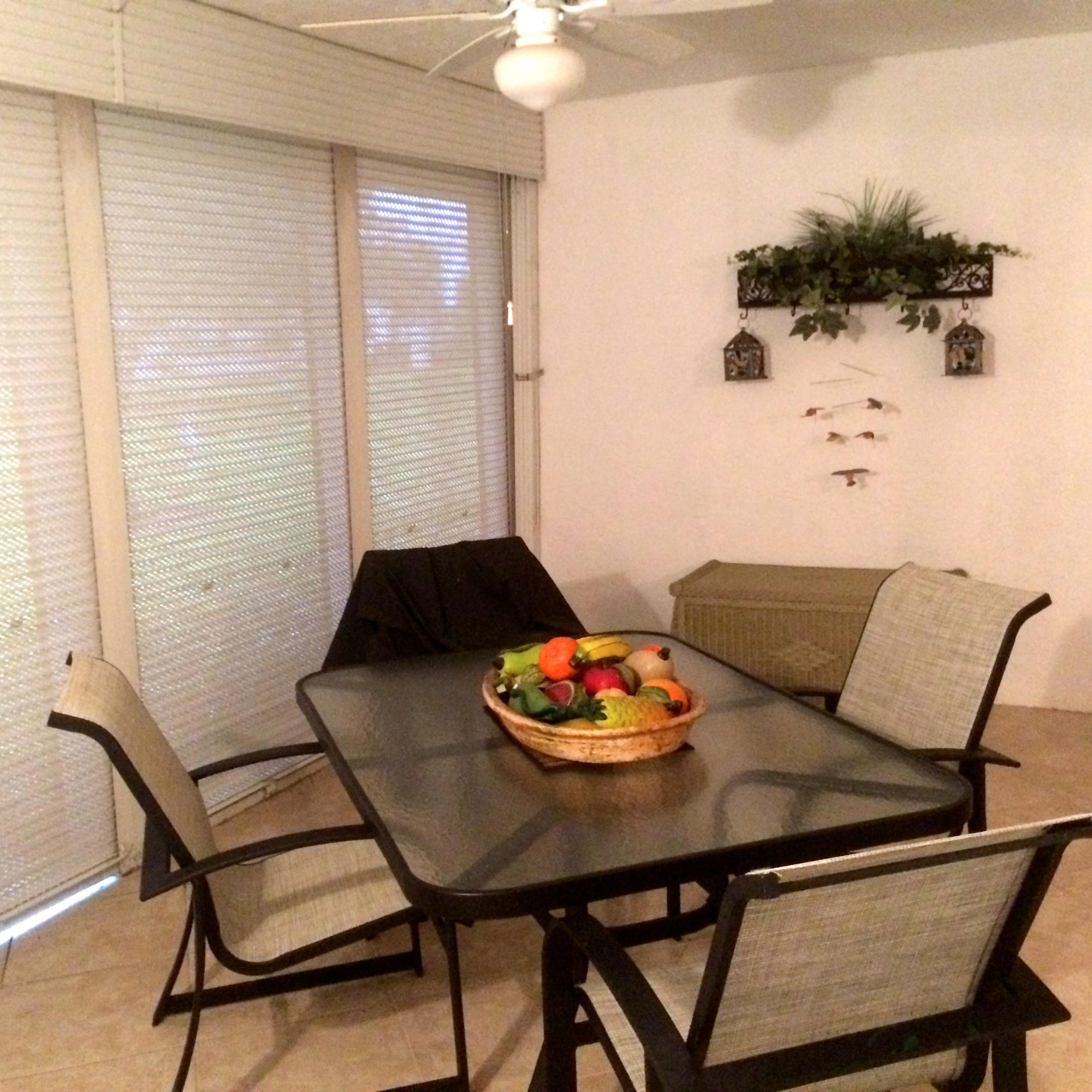 7540 Diamond Pointe Circle Delray Beach, FL 33446 - Photo 16 of 18 a living room with furniture and a potted plant