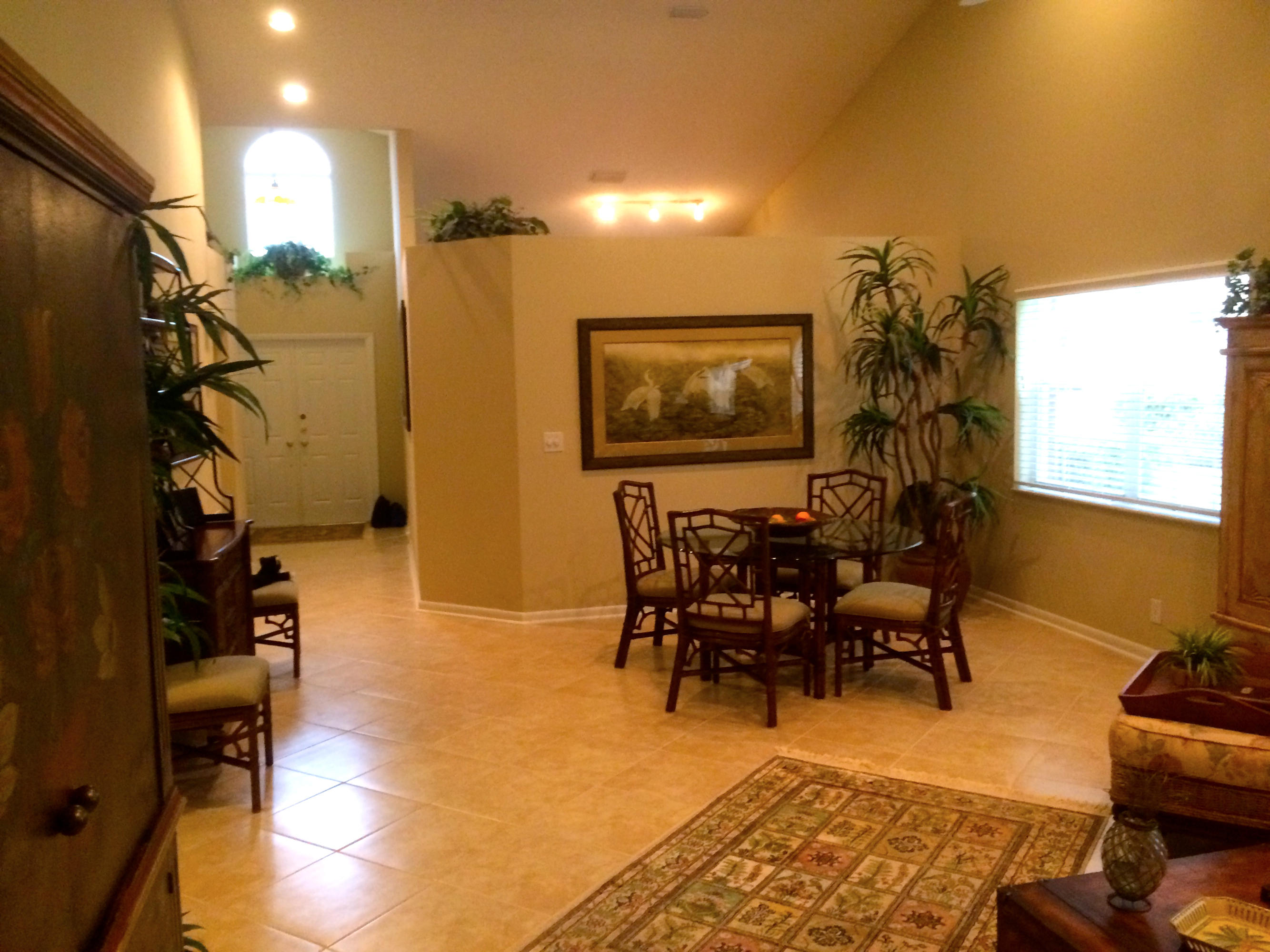 7540 Diamond Pointe Circle Delray Beach, FL 33446 - Photo 7 of 18 a view of a livingroom with furniture and a couch