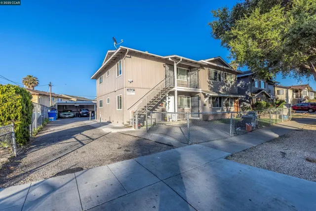 a view of a street with cars