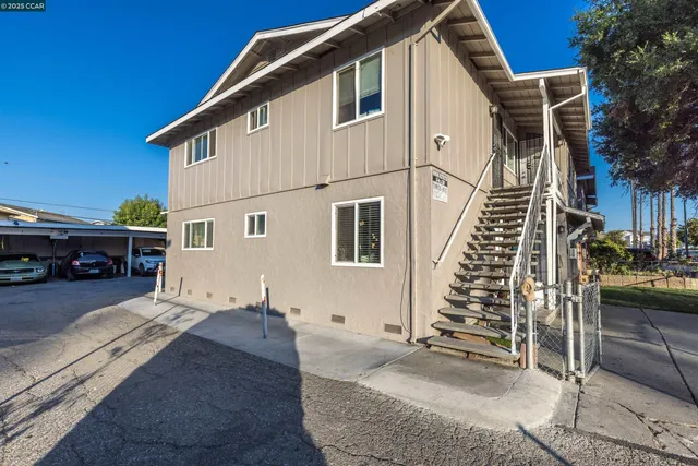 a view of a house with a patio