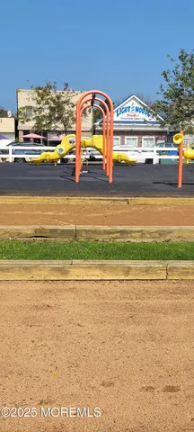 a view of a swimming pool with an ocean view
