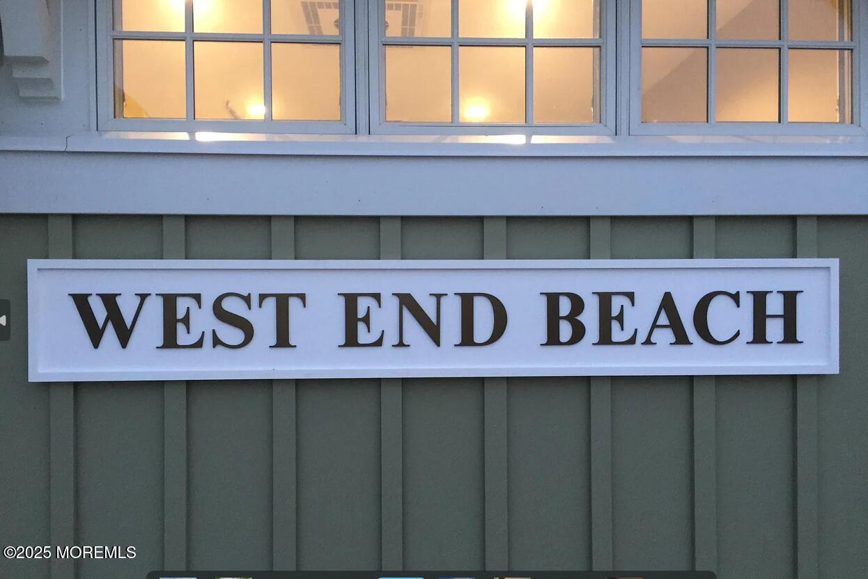 Undisclosed Address Long Branch, NJ 07740 - Photo 22 of 22 a street sign that is sitting on a wall