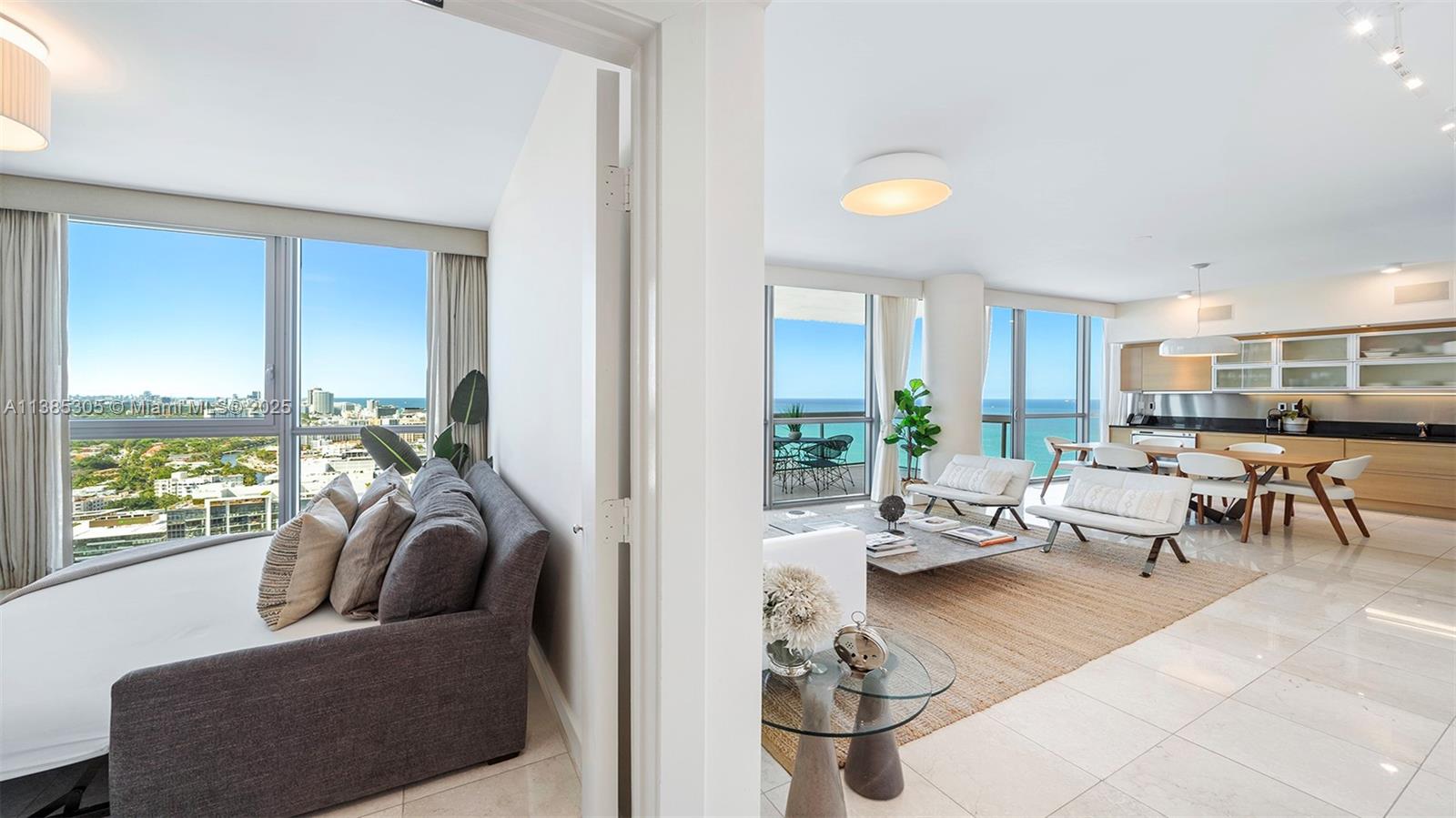 101 20th Street, Unit 3903 Miami Beach, FL 33139 - Photo 18 of 46 a living room with furniture and a large window