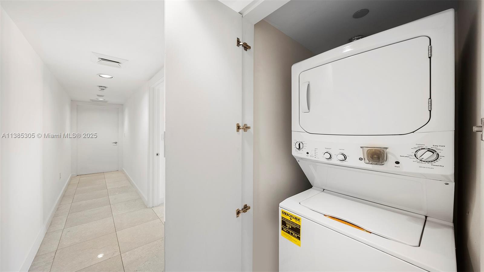 101 20th Street, Unit 3903 Miami Beach, FL 33139 - Photo 28 of 46 a utility room with dryer and washer