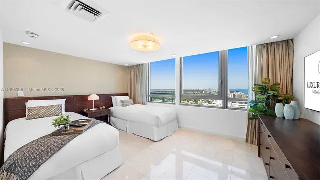 a view of hotel and bedroom