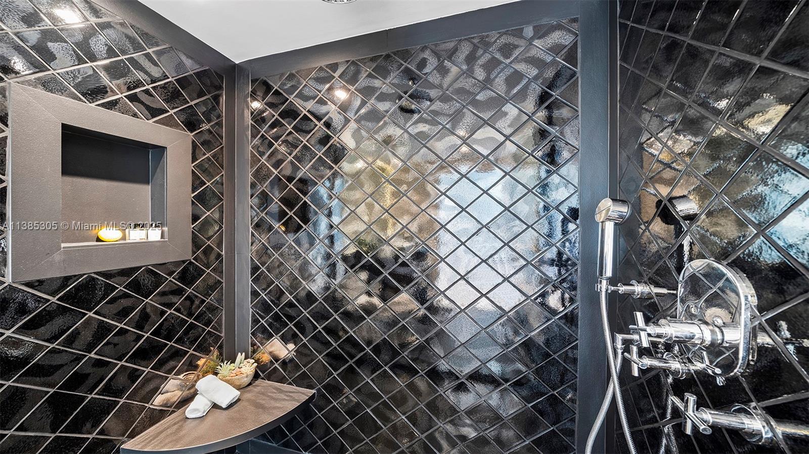 101 20th Street, Unit 3903 Miami Beach, FL 33139 - Photo 33 of 46 a bathroom with a shower