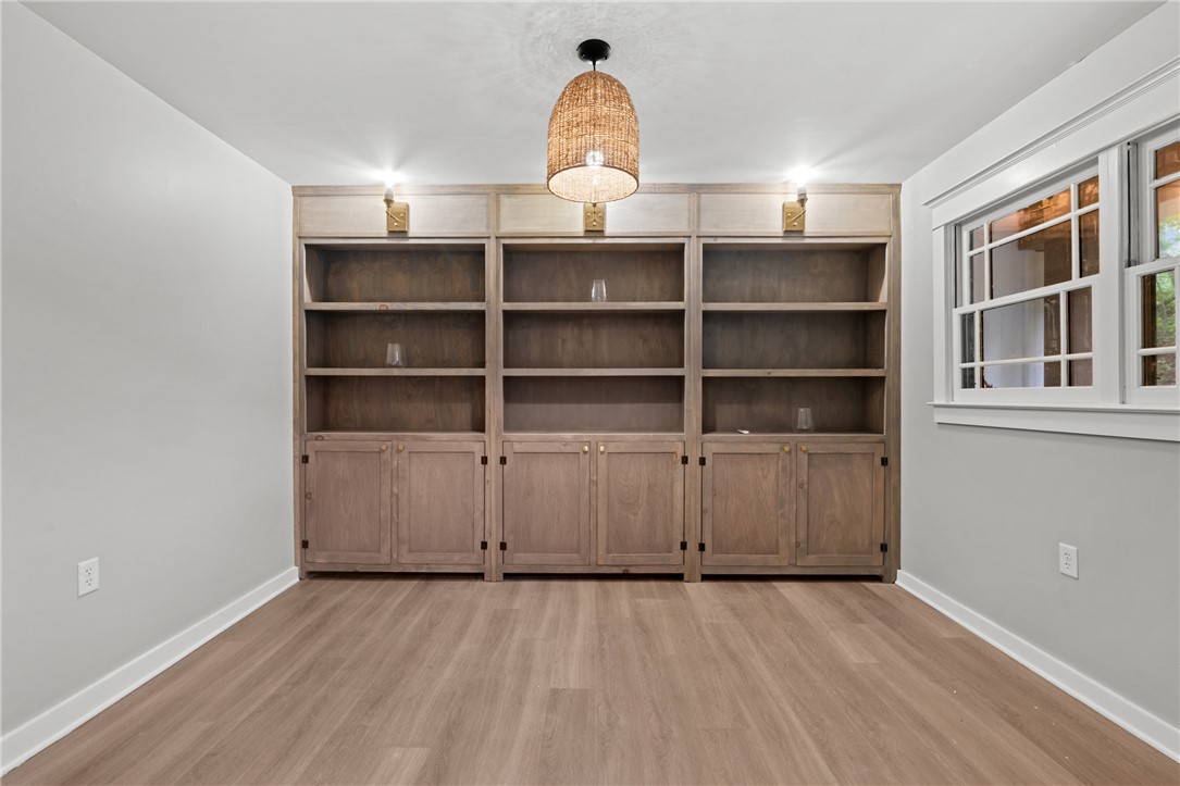 309 Woodland Way Clemson, SC 29631 - Photo 12 of 43 This versatile room features elegant built-in shelving and ample natural light.