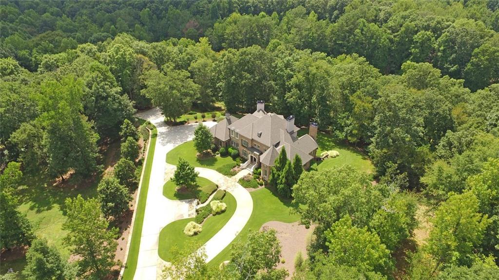 198 Deer Ridge Hoschton, GA 30548 - Photo 1 of 1 Thank goodness for shots like this as it is hard to capture the beauty of this home and property without an aerial view.