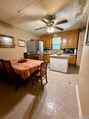a view of a dining room with furniture