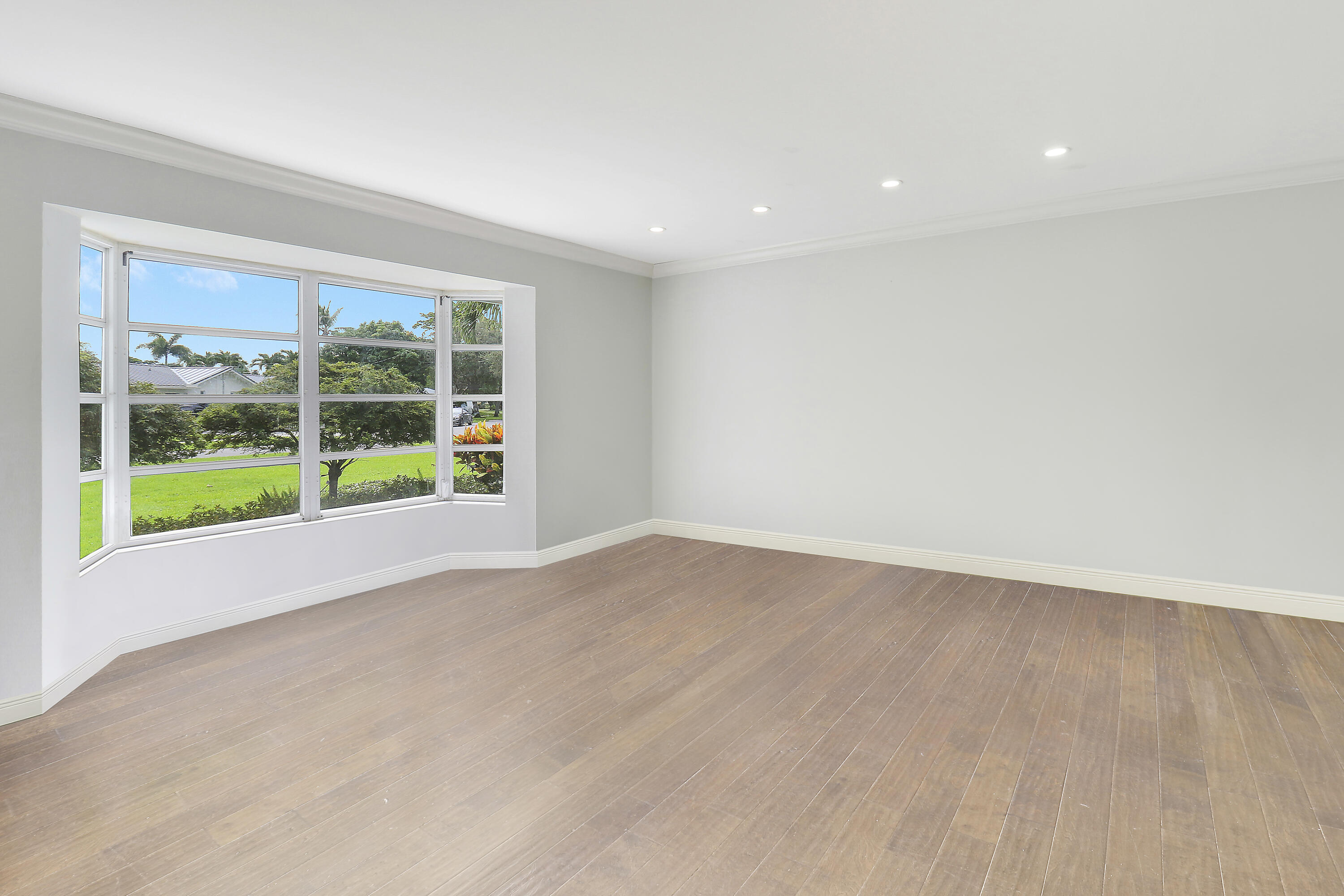 749 Cruiser Road North North Palm Beach, FL 33408 - Photo 12 of 46 a view of an empty room with a window