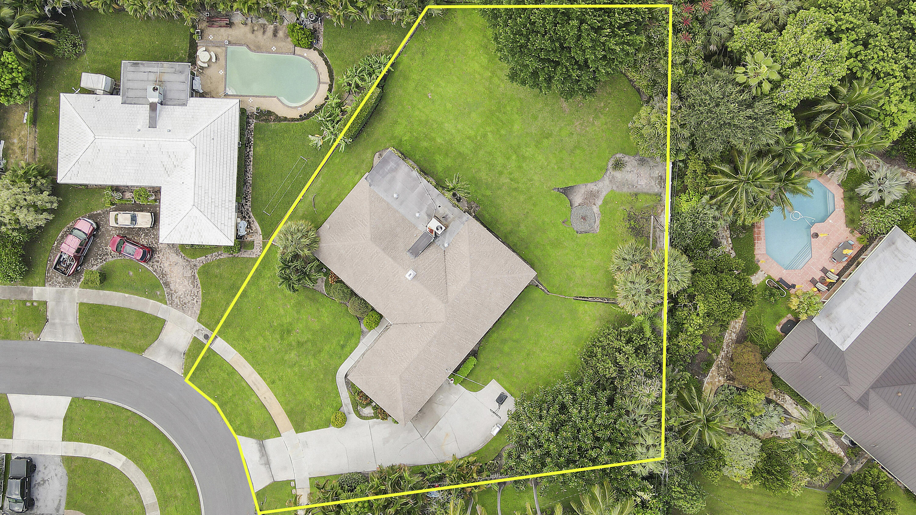 749 Cruiser Road North North Palm Beach, FL 33408 - Photo 2 of 46 an aerial view of a golf course with parking space