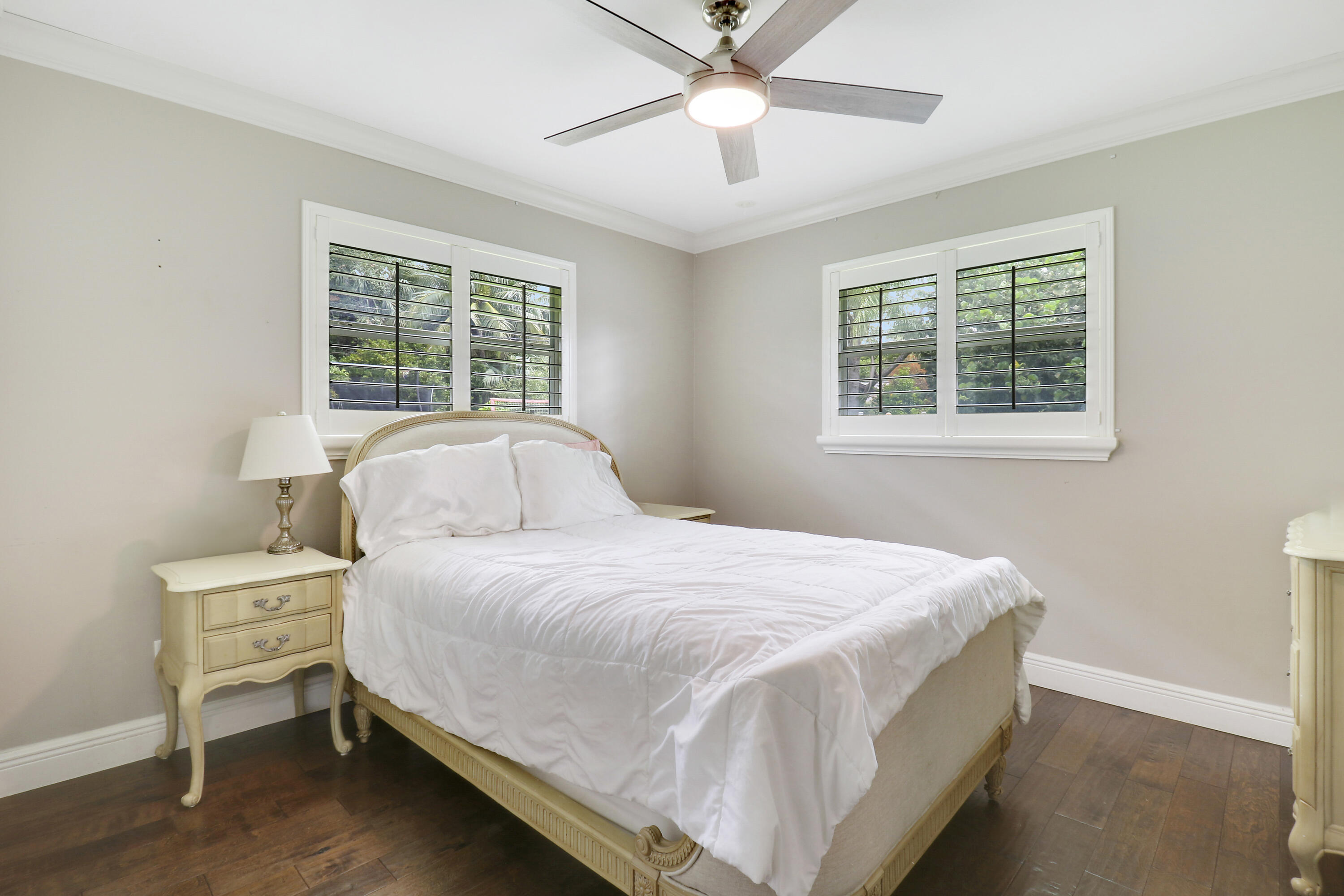 749 Cruiser Road North North Palm Beach, FL 33408 - Photo 22 of 46 a bedroom with a bed and a window