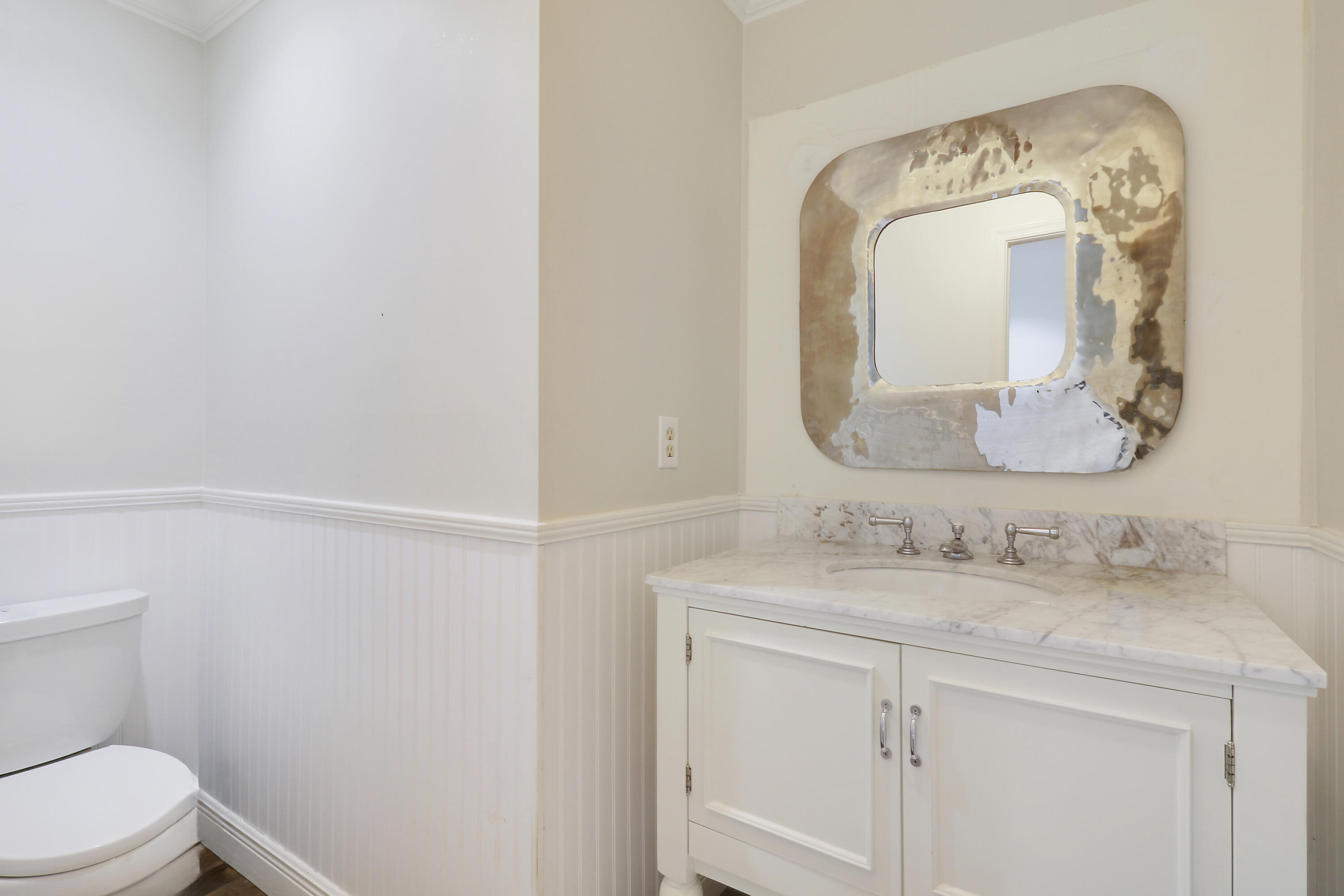 749 Cruiser Road North North Palm Beach, FL 33408 - Photo 25 of 46 a bathroom with a sink vanity mirror and toilet