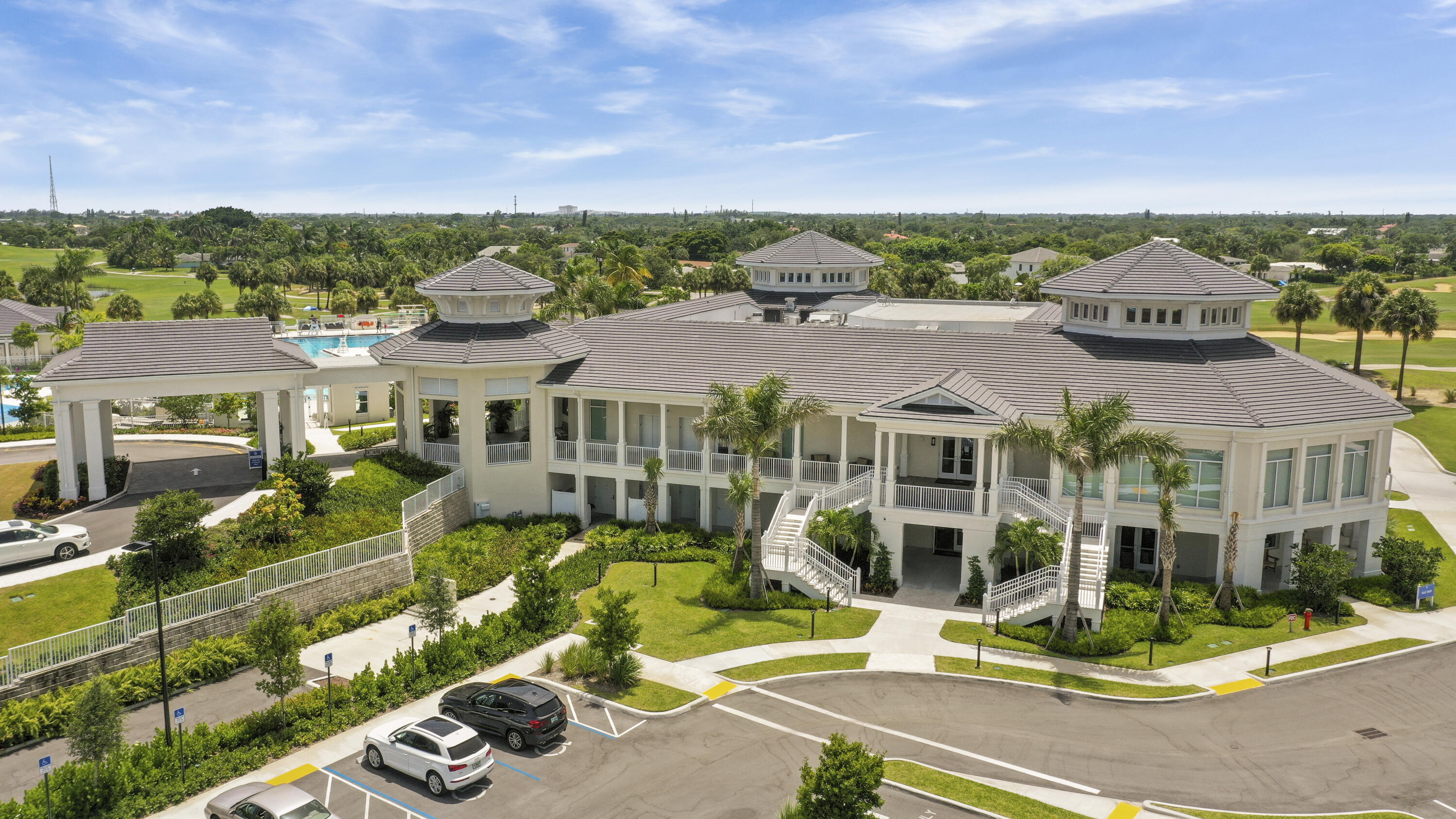 749 Cruiser Road North North Palm Beach, FL 33408 - Photo 33 of 46 a front view of a house with a garden