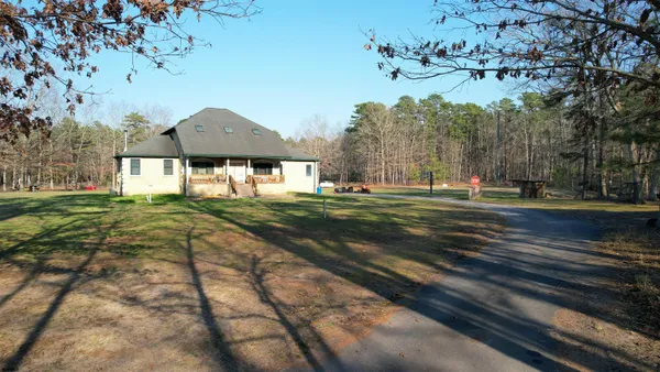 a view of a house with a big yard