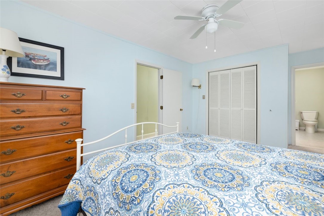 270 Buckeye Brook Road Charlestown, RI 02813 - Photo 22 of 45 Primary bedroom with access to second floor full bathroom with laundry