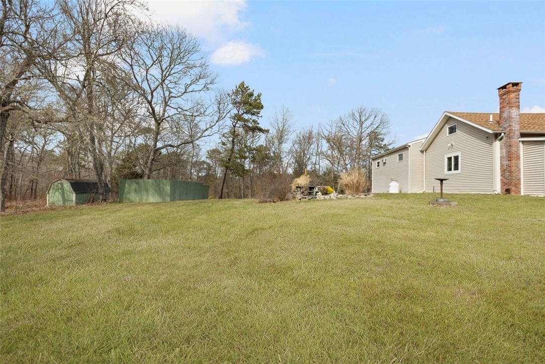 270 Buckeye Brook Road Charlestown, RI 02813 - Photo 33 of 45 Large private backyard with shed