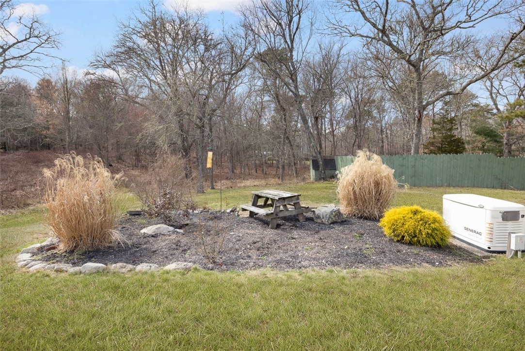 270 Buckeye Brook Road Charlestown, RI 02813 - Photo 40 of 45 Back garden with whole house generator!